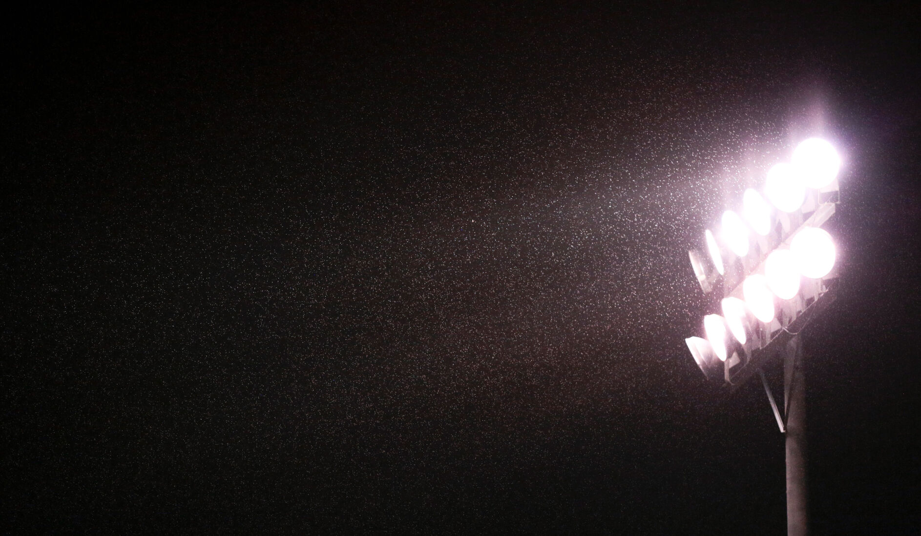 The beginnings of rain glow in Tolton’s stadium lights on Friday